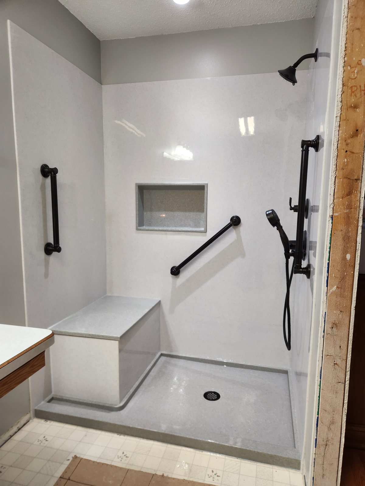 Completed bathroom shower remodel by Mohr Plumbing and Heating